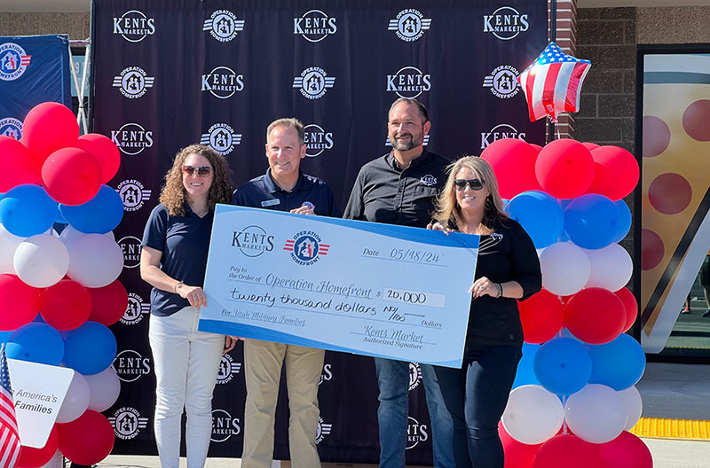 image of Kent's Market employees making donation to Operation Homefront