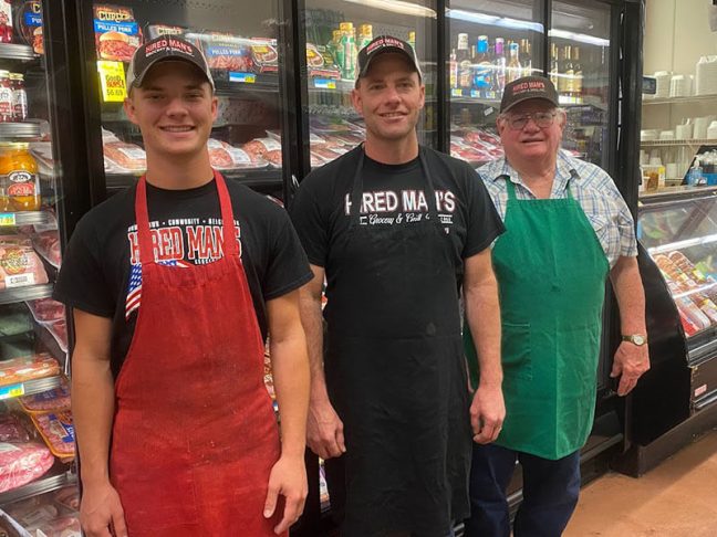 image of Colby, Clint and George Osner in meat department