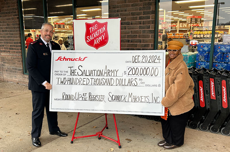 image of big check donation from Schnucks to The Salvation Army