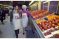 image of H-E-B Chairman Charles Butt touring the first Central Market with Texas Gov. Ann Richards in 1994