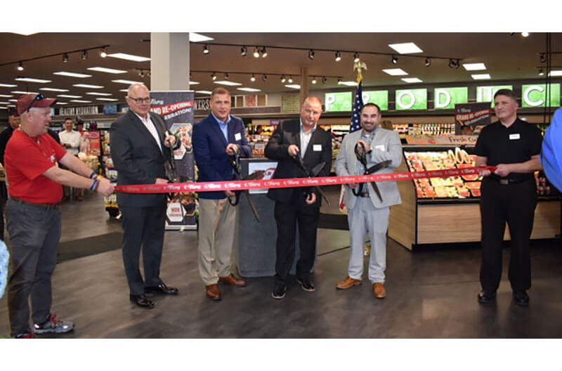 Tops officials cut the ribbon at the Williamsville store.