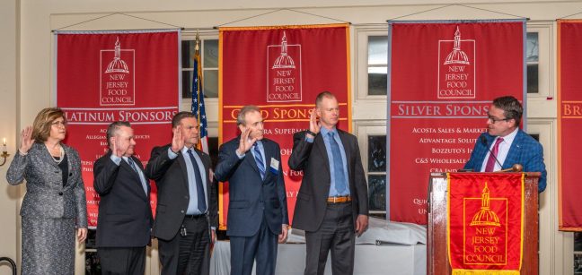 Officers being sworn in at the NJFC's annual meeting