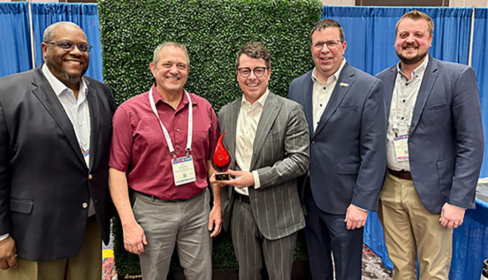 group photo of Fareway leaders with Shelby's Publishing Exceptional Independents Award