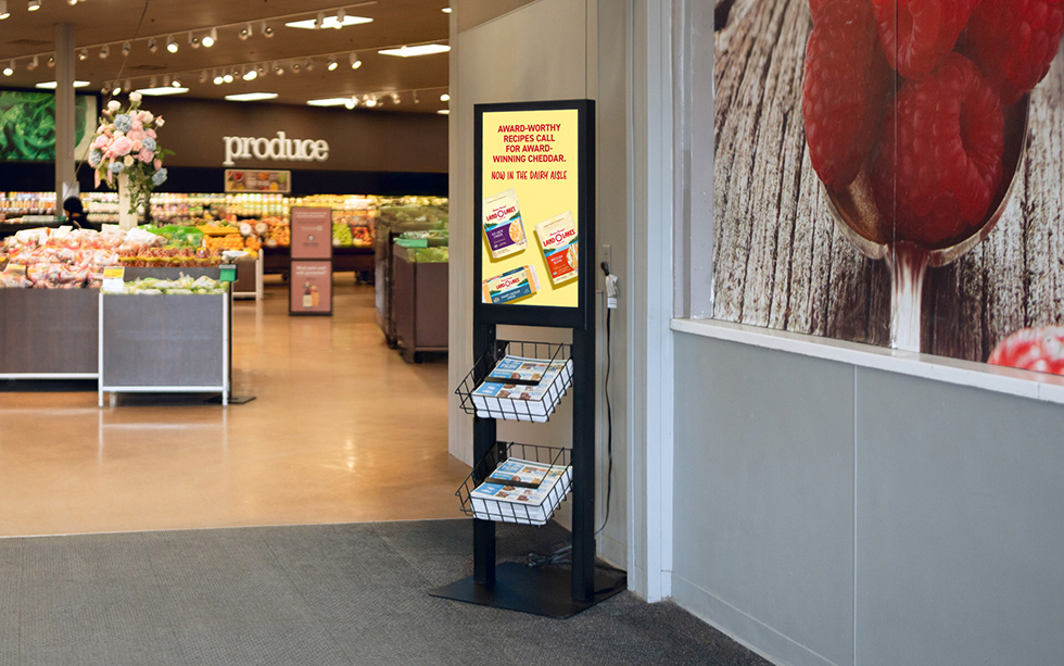 Grocery TV’s Digital Ironman at Northeast Grocery entrances is part of a full-store media strategy, with additional screens at checkout and pharmacy designed to engage shoppers throughout their visit.