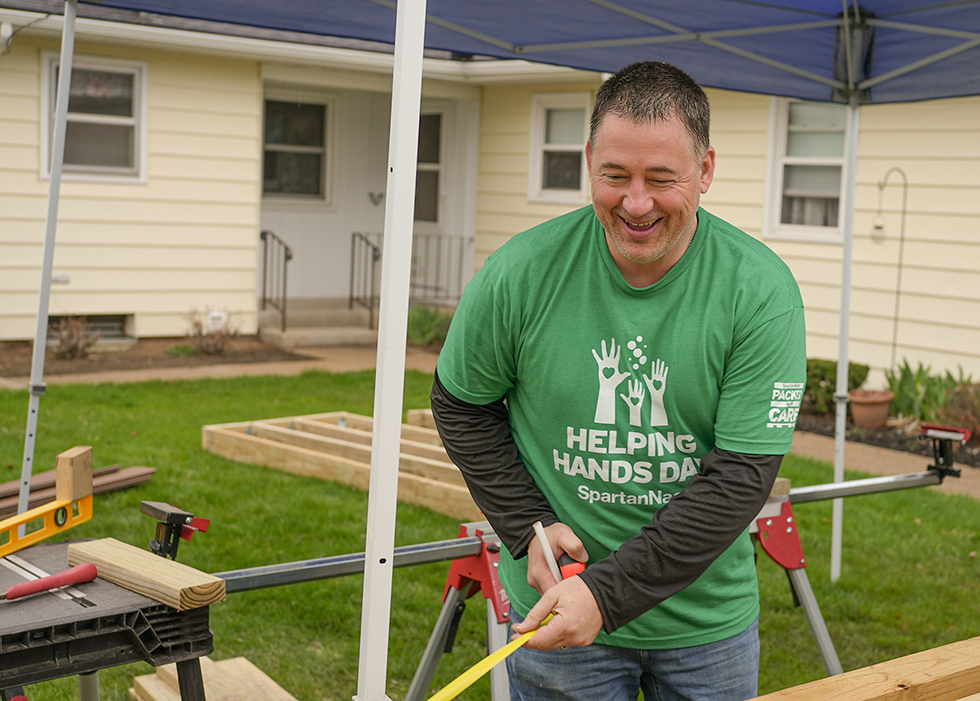 The accessibility ramp – which was constructed by SpartanNash Associate volunteers using composite decking boards made from recycled plastic bags – will provide a safer home to a West Michigan Veteran, who served in the U.S. Marines during the Vietnam War era.