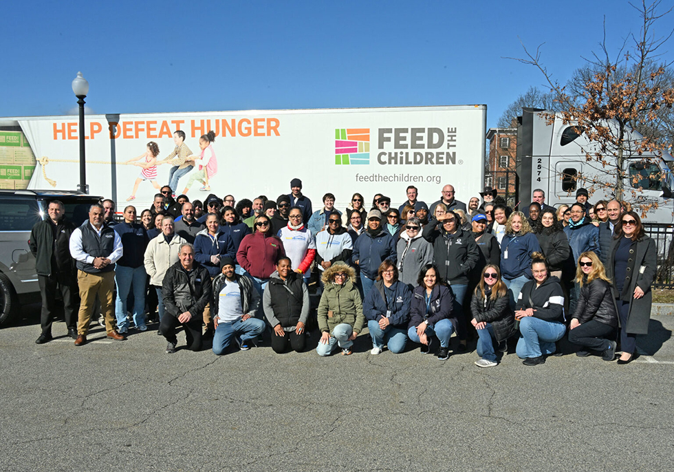 Price Rite Marketplace and Feed the Children pose together for a group photo