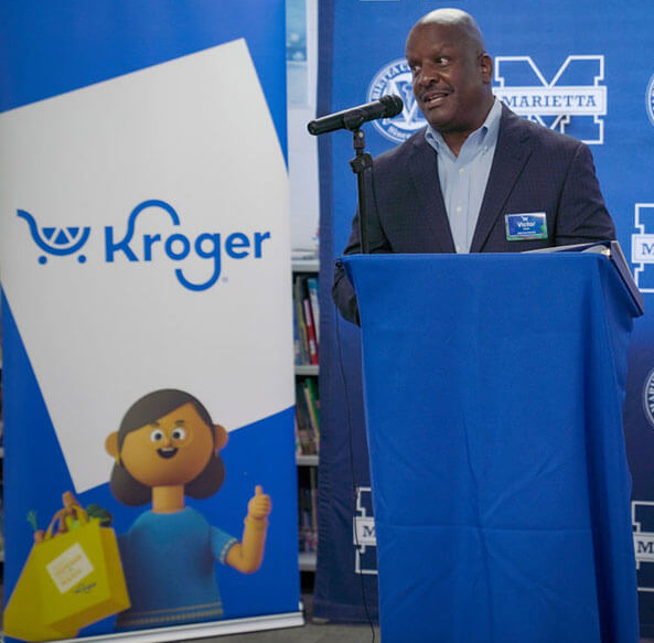 image of Kroger Atlanta Division President Victor Smith standing at podium