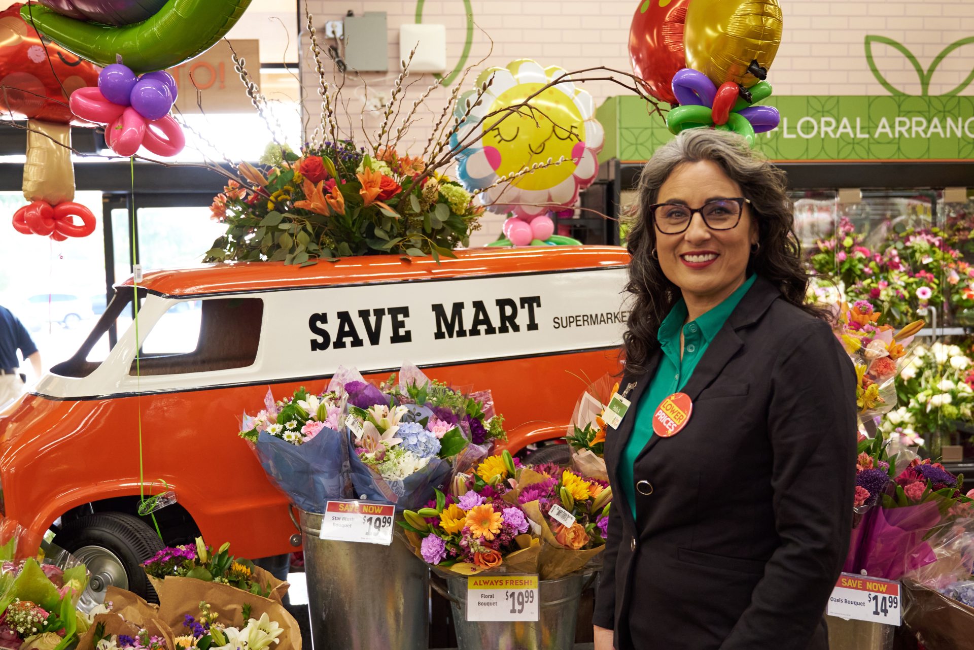 Save Mart Store Manager Holly Alton stands next to the company’s authentically retro Go-Kart van. Shoppers have the opportunity to name the van by submitting ideas via Save Mart’s Instagram. Photo credit: Alfonso Rojas, Rojas Photography