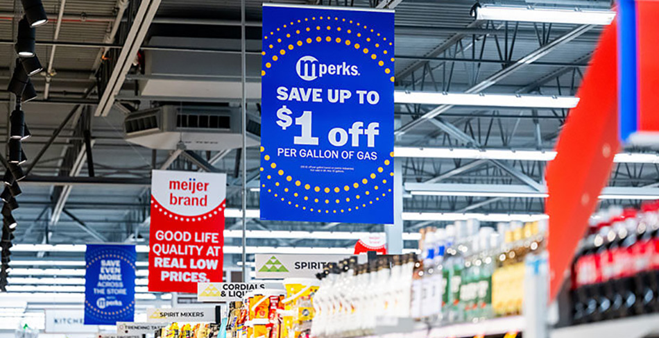 image of banners promoting Meijer mPerks awards program hanging from store ceiling