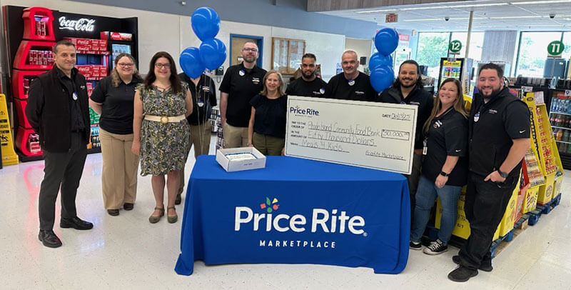 image of Price Rite Marketplace team presenting check to Rhode Island Food Bank