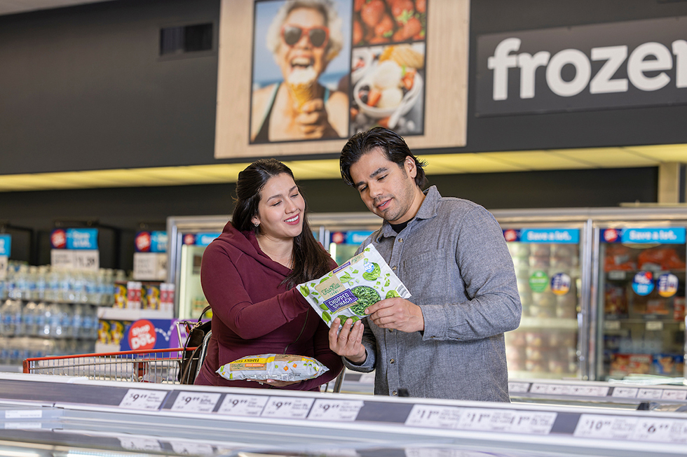 Save A Lot shoppers looking at private label products