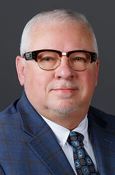 headshot of Carl Marks