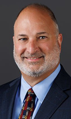 headshot of David Politz with Associated Grocers