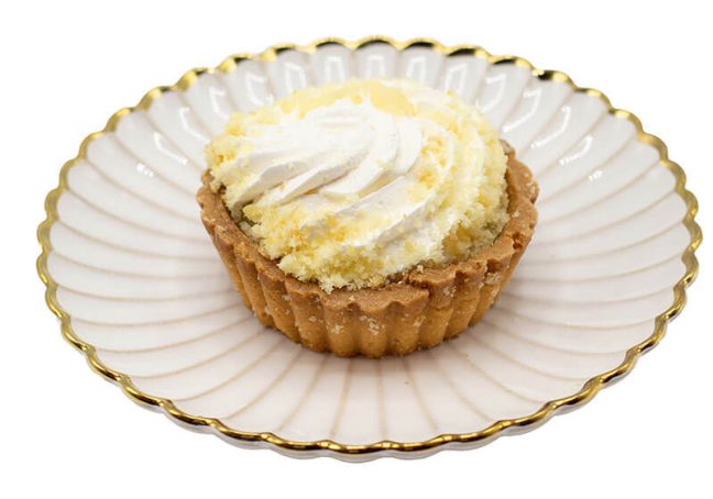 photo of a Limoncello tart on white decorative plate