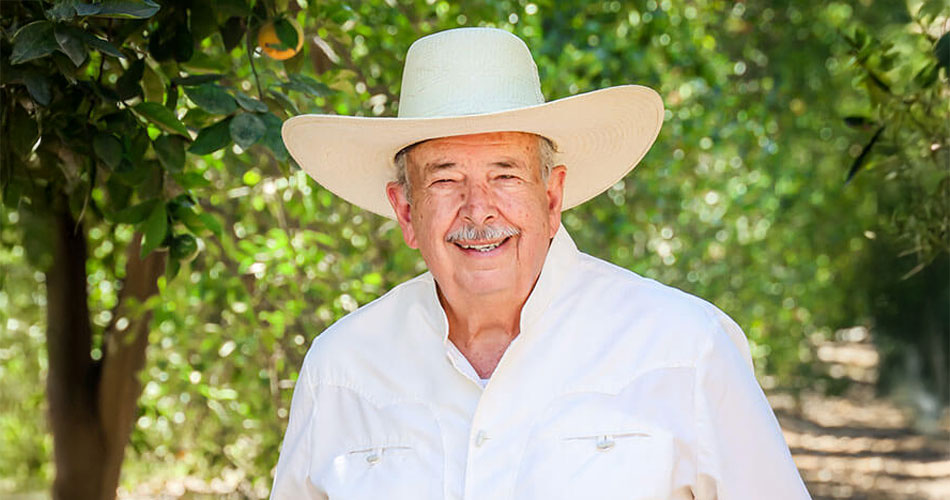 headshot of Miguel González