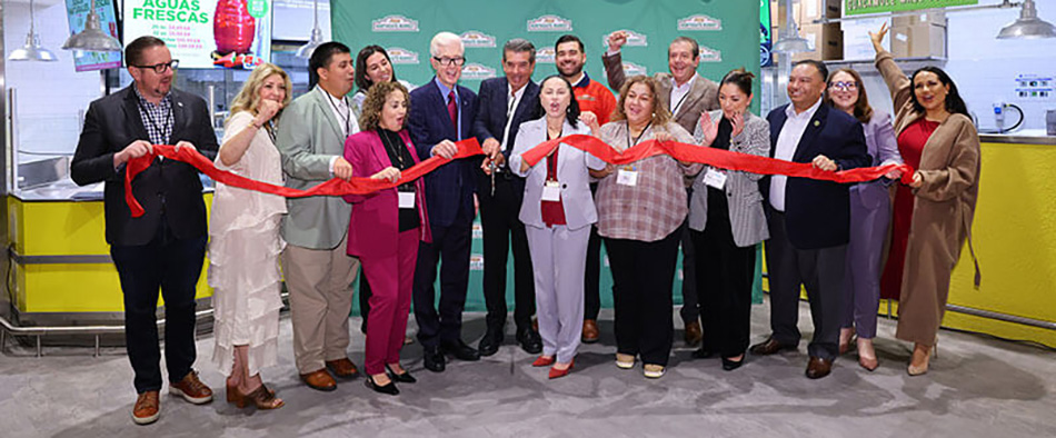 photo of group cutting ribbon at Northgate Gonzalez Market opening in Lynwood, California
