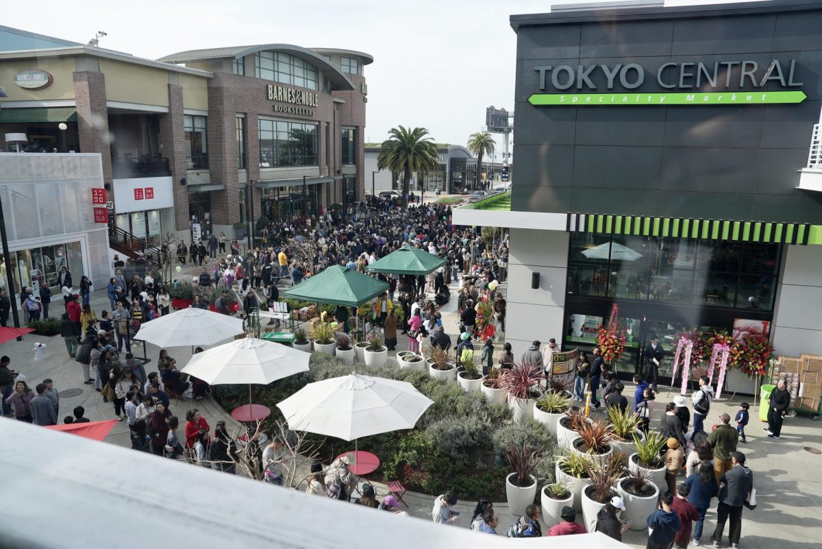 Crowds gather outside the new Tokyo Central specialty market grand opening at Bay Street Emeryville.