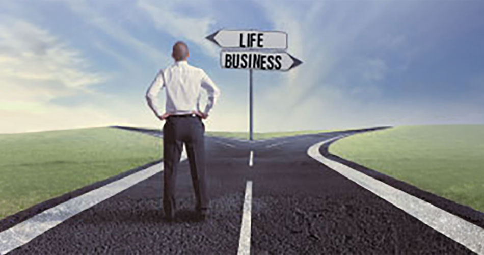 image of man standing at crossroads with signposts pointing to life, business