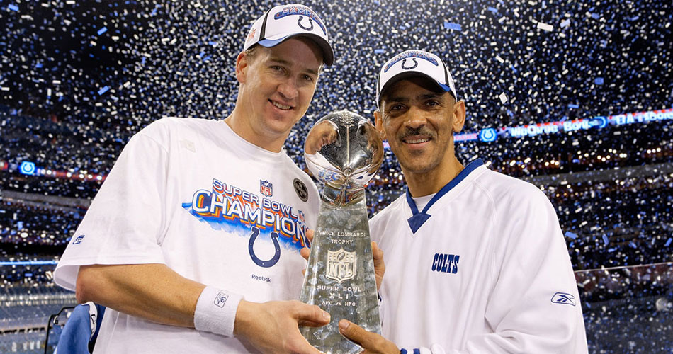 photo of Peyton Manning and Tony Dungy holding Super Bowl trophy
