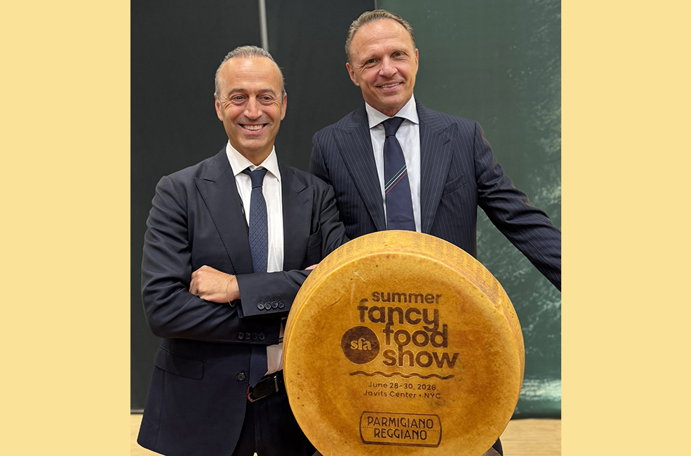 Consorzio del Parmigiano Reggiano President Nicola Bertinelli and Italy's Minister of Agriculture Francesco Lollobrigida (left to right) at this year's Summer Fancy Food Show
