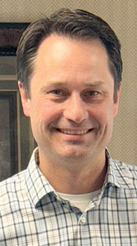headshot of Rosauers CEO Cliff Rigsbee