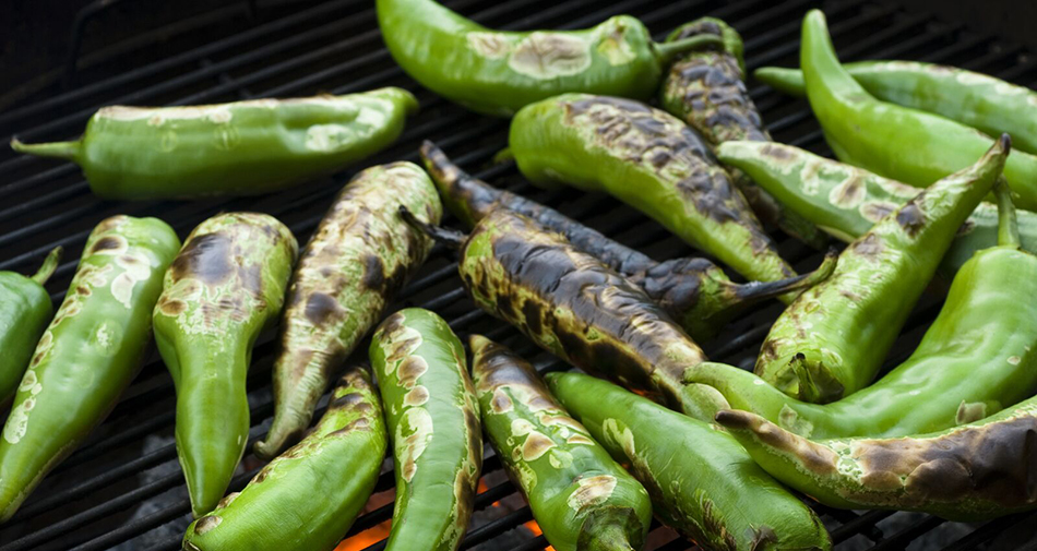 photo of Hatch chile peppers roasting on grill