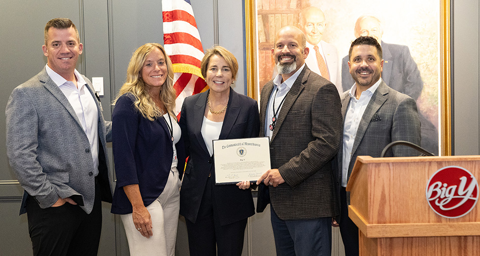 photo of D’Amour family members Matt, Nicole, Michael and Colin joined by Governor Maura Healey