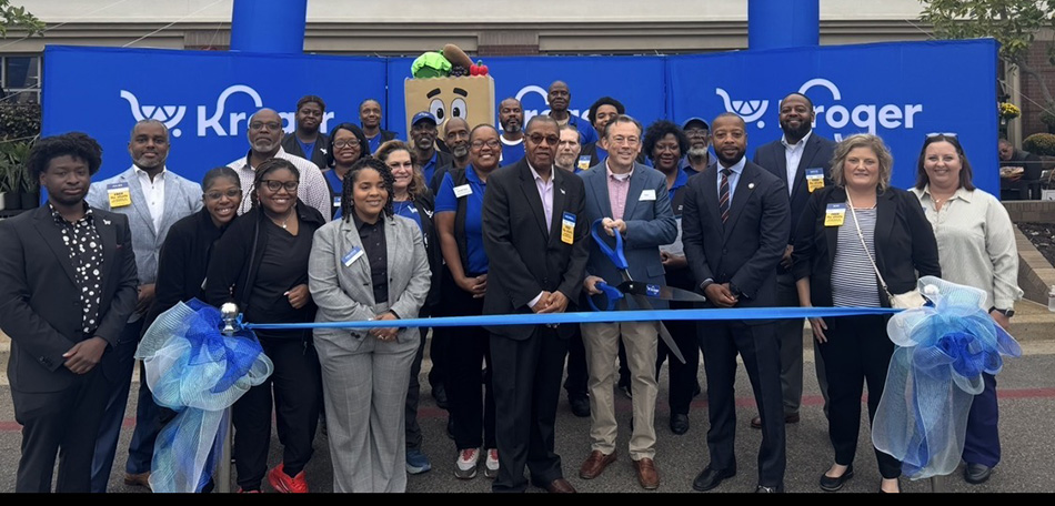 photo of group at ribbon cutting for grand-reopening of Kroger store in Cordova, TN