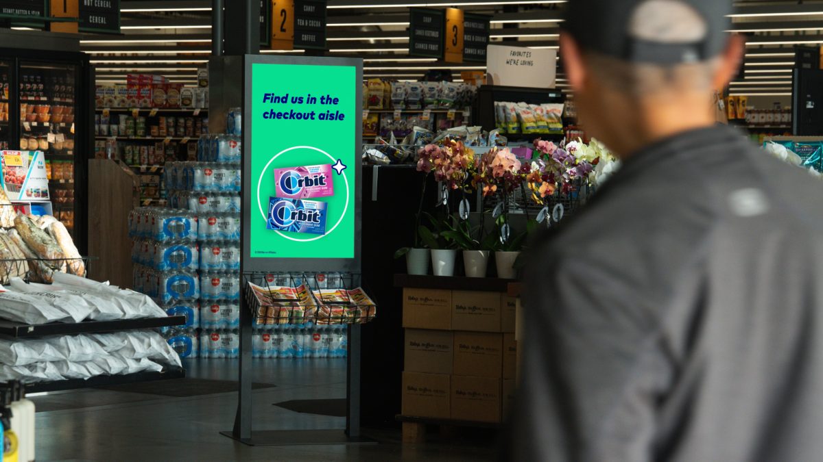GroceryTV at store entrance